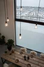 Afbeelding in Gallery-weergave laden, SQUID textile window foil color chalk transparent in a living area with a set table and modern chandelier