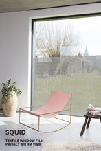 Charger l&#39;image dans la galerie, pink chair in front of large window with SQUID Rock, a window film made from textiles
