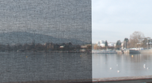 Load image into Gallery viewer, Close-up of Coal transparent on a window, contrasted against a clean glass
